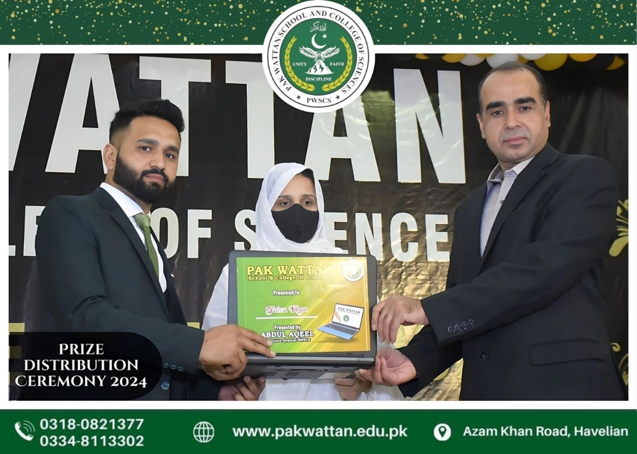 Miss Fiza Khan receiving Laptop
